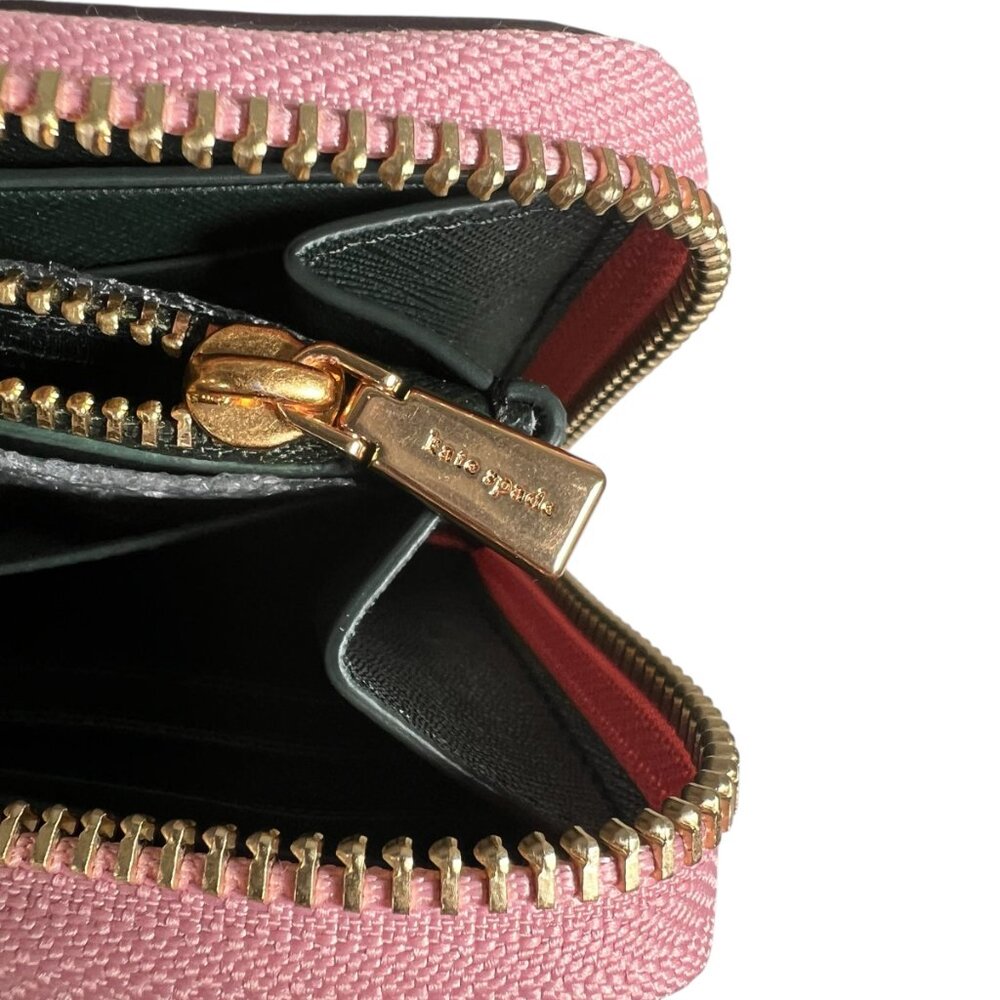 Share Similar items Sponsored See all  Kate Spade Sylvia Continental Zip Around - Picture 9 of 13